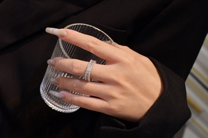 Close-up of S925 silver eternity ring with rectangular cut cubic zirconia stones