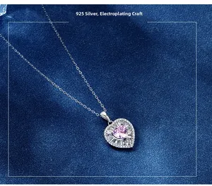 Detail of 925 sterling silver necklace with heart-shaped pink zircon and micro-pave setting