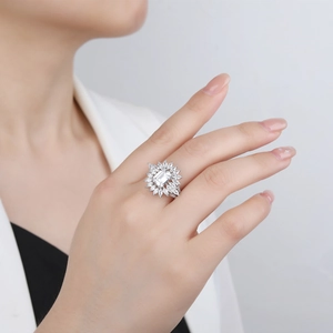 Luxurious 925 silver ring featuring a large emerald-cut center stone in a floral setting