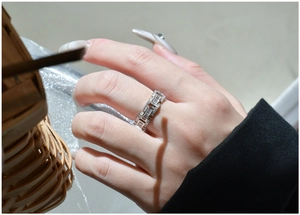 Detail view of 925 silver ring featuring baguette-cut and round-cut cubic zirconia