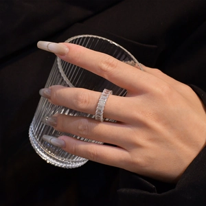 S925 sterling silver eternity ring with channel set rectangular cut zircon on a hand