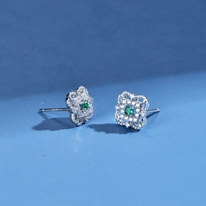 S925 sterling silver four-leaf flower studs with emerald-green center and zircon pave