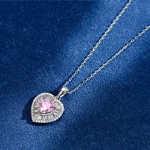 Elegant 925 sterling silver necklace with heart-shaped pink gem and diamond halo
