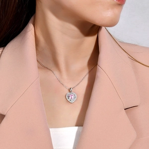 925 silver necklace featuring a heart-shaped pink diamond pendant with halo setting