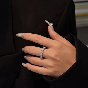 Sparkling 925 sterling silver eternity band ring with circular cut zirconia stones
