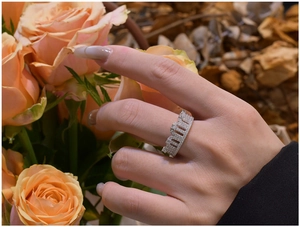 Macro shot of a 925 silver crown ring with pavé-set zircons worn on a model's finger