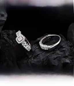 Macro view of S925 silver rings set with square cluster micro-pave cubic zirconia