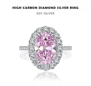 Macro detail of 5.6 carat oval pink carbon diamond ring set in polished S925 sterling silver