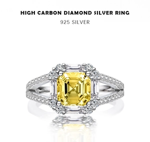 Macro shot of 925 silver ring featuring a yellow radiant cut stone and halo diamonds