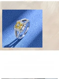 Detail of 925 silver ring featuring a square yellow carbon diamond and micro-pave setting
