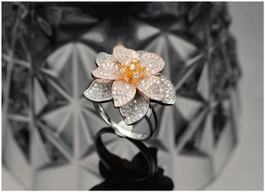 Detailed macro view of S925 silver floral ring with tricolor petals and pavé micro-inlays