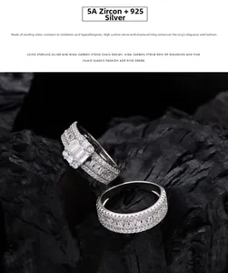 Macro shot of 925 silver rings set featuring 5A zircon with rectangular cut on dark coal