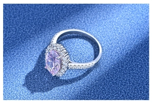 Detailed view of the 5.6 carat oval pink carbon diamond ring with halo setting in S925 silver