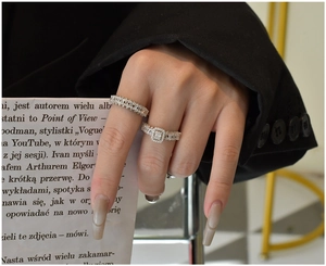 Macro detail of S925 sterling silver stacked rings with cubic zirconia pavé setting