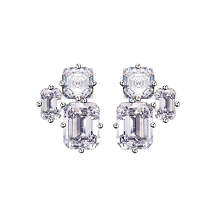 Asymmetric 925 sterling silver stud earrings with emerald cut cubic zirconia stones