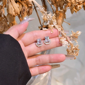 U-shaped S925 silver stud earrings with emerald cut zircon and micro-paved border