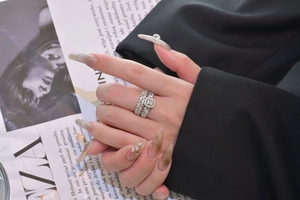 Close-up of S925 silver double-set rings with square-cut center stone and pave diamonds