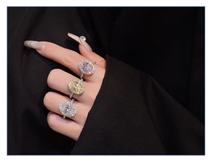 Three oval halo rings in pink, yellow, and clear carbon diamonds set in S925 silver