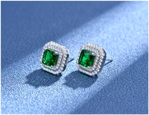 Macro shot of S925 sterling silver square emerald earrings with double halo micro-pave crystals