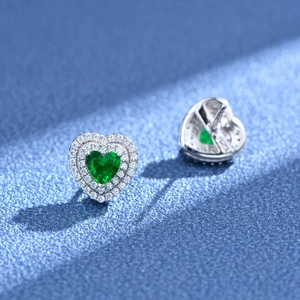 Classic S925 sterling silver heart-shaped emerald stud earrings with halo diamond accents