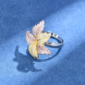 Three-tone S925 silver petal ring with rose gold accents and pavé micro-zirconia stones