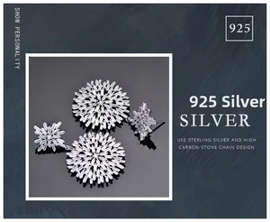 Macro shot of 925 sterling silver snowflake earrings with radiant high carbon stones