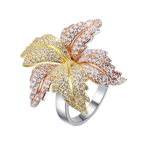 Three-tone S925 silver leaf ring with layered gold and rose gold petals set with zircons