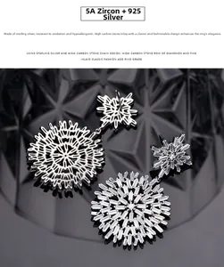 Macro shot of S925 sterling silver snowflake stud earrings with 5A cubic zirconia stones