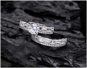Detailed macro view of 925 silver rings with round and baguette-cut cubic zirconia
