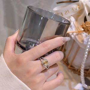 Elegant 925 sterling silver ring with square yellow gemstone and split shank on model