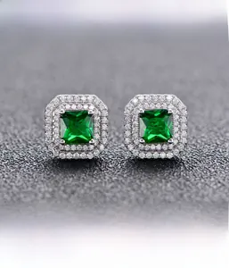 Detail of square emerald earrings with double halo micro-pave cubic zirconia stones