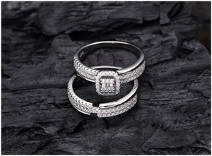 Macro shot of S925 sterling silver ring set with zircon pavé on a dark charcoal background