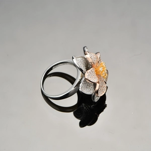 Elegant S925 silver flower ring with gold plating and cubic zirconia stones
