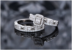 Macro shot of S925 silver double ring set with halo square cut zircon and pavé diamonds