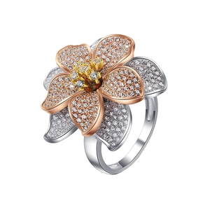 Three-tone flower ring in S925 silver with crystal micro-pave petals on white background