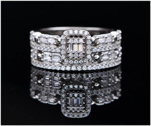 Macro shot of S925 silver ring featuring rectangular cluster of pavé set baguette diamonds