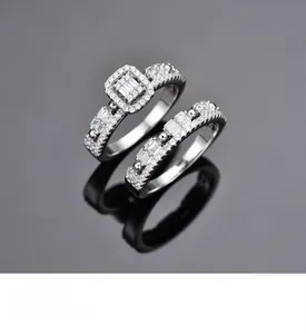 Macro shot of S925 silver double ring set with halo square cut stone and micro pavé detail