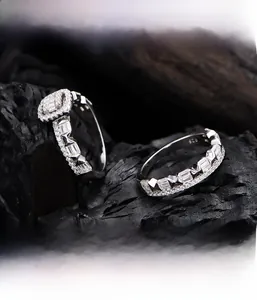 Macro shot of S925 sterling silver stacked rings with micro-set baguette zirconias