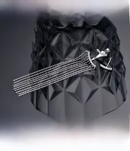 Macro shot of 925 silver fringe earrings featuring precision micro-inlay craftsmanship