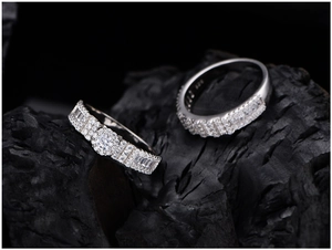 Macro shot showing S925 hallmark on silver ring set with micro-pave crystals