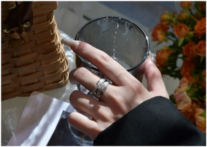 Detail of wide S925 silver ring featuring micro-pave crystals and a large rectangular stone
