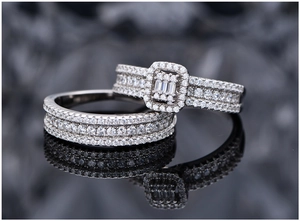 Macro detail of S925 sterling silver stacked rings with cubic zirconia pavé setting