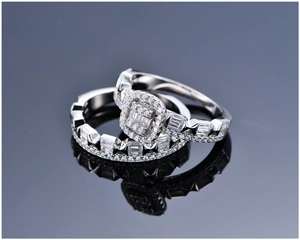 Macro view of two-piece bridal ring set in S925 silver with baguette cut diamonds