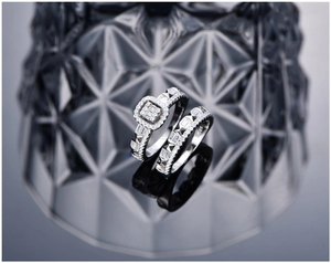 Close-up of S925 sterling silver ring set with square clusters and baguette diamonds