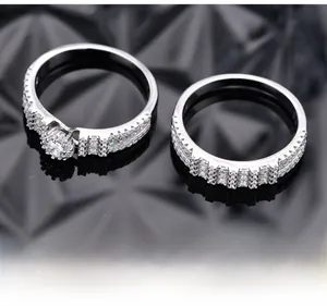 Macro shot of S925 silver snowflake stackable rings with micro-pave diamonds in platinum finish