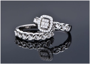 Macro shot of silver S925 rings with cuban chain design and sparkling zircon details