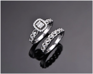 Macro shot of S925 silver halo ring set with cubic zirconia and twisted band detail