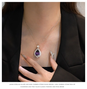 Detailed view of waterdrop purple gemstone pendant on S925 sterling silver chain
