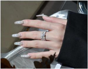 Close-up of S925 silver snowflake ring set featuring a large round brilliant main stone