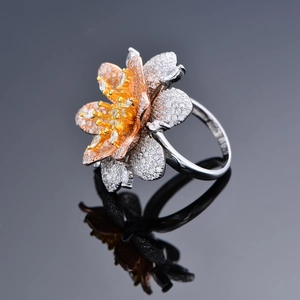 Exaggerated S925 silver flower ring with micro-pave zircons and rose gold petals